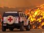 HUMMER Helps Battle Wildfire Over Holiday Weekend - Trained American Red Cross volunteers of San Diego/Imperial Counties Chapter the used their HUMMER H3 to deliver critical nourishment to more than 100 firefighters battling hay fires in Seeley, California over the holiday weekend. This H3 is one of 19 HUMMER Red Cross response vehicles in service around the country. Photo credit: Brad Mellon, American Red Cross, San Diego/Imperial Counties Chapter. X07HM_H3089 (United States)