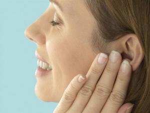 Young Woman with Earache --- Image by © image100/Corbis
