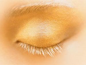 Woman's Eyelid with Yellow Eye Shadow --- Image by © Adrianna Williams/zefa/Corbis