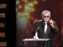 Jerzy Skolimowski z nagrodą przyznaną w kategorii najlepsza reżyseria za film "Essential Killing"